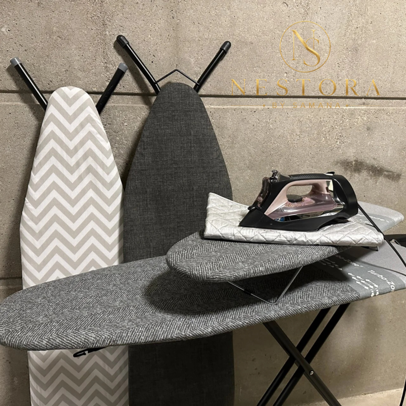 Foldable portable ironing mat for ironing clothes on a table